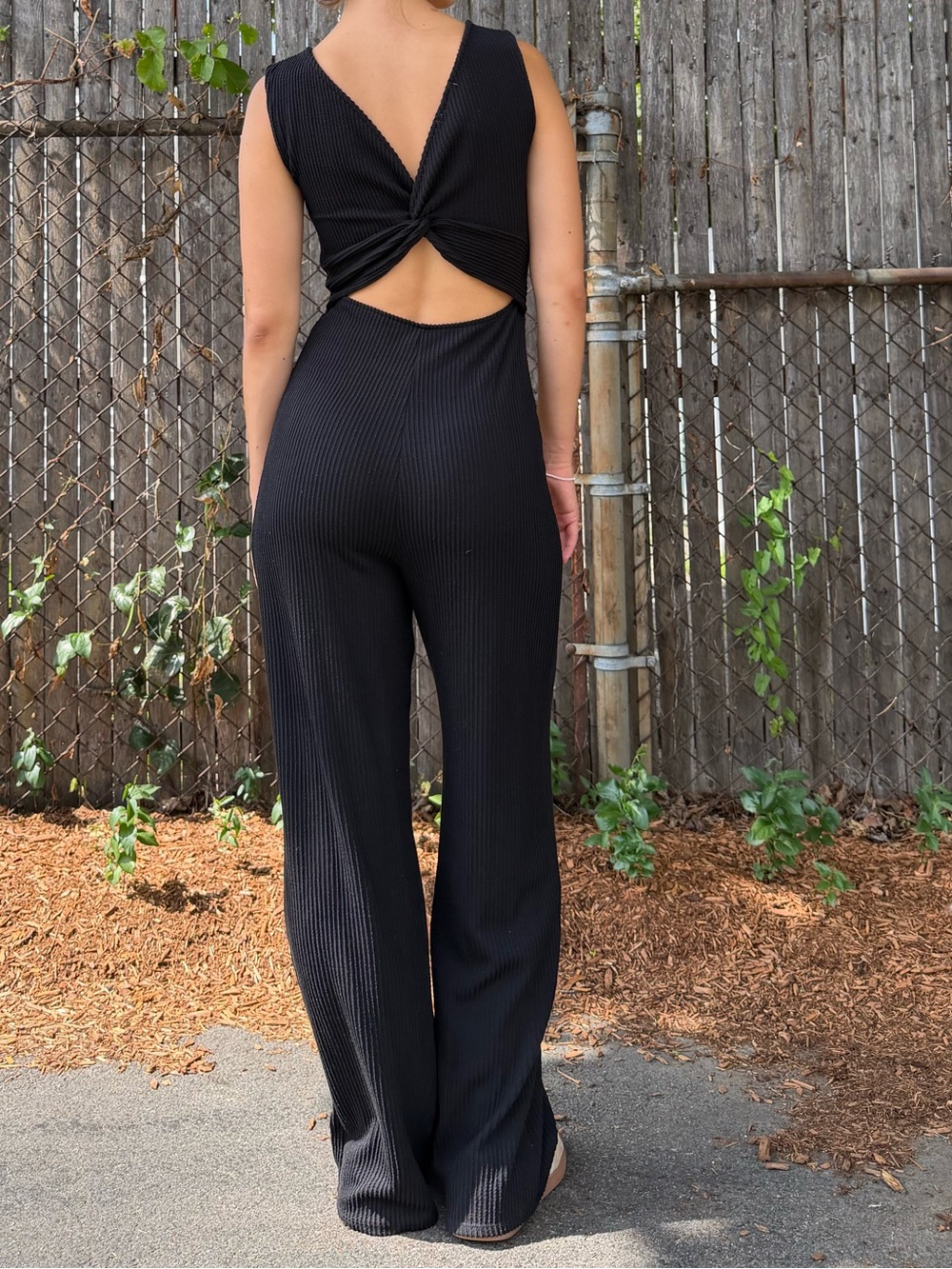 Black Ribbed Wide-Leg Jumpsuit with Twist-Back Cutout